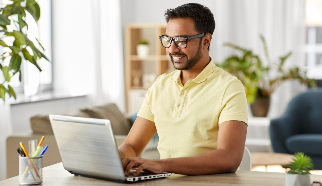 man working on his laptop